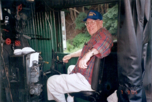 In the engineer's seat.